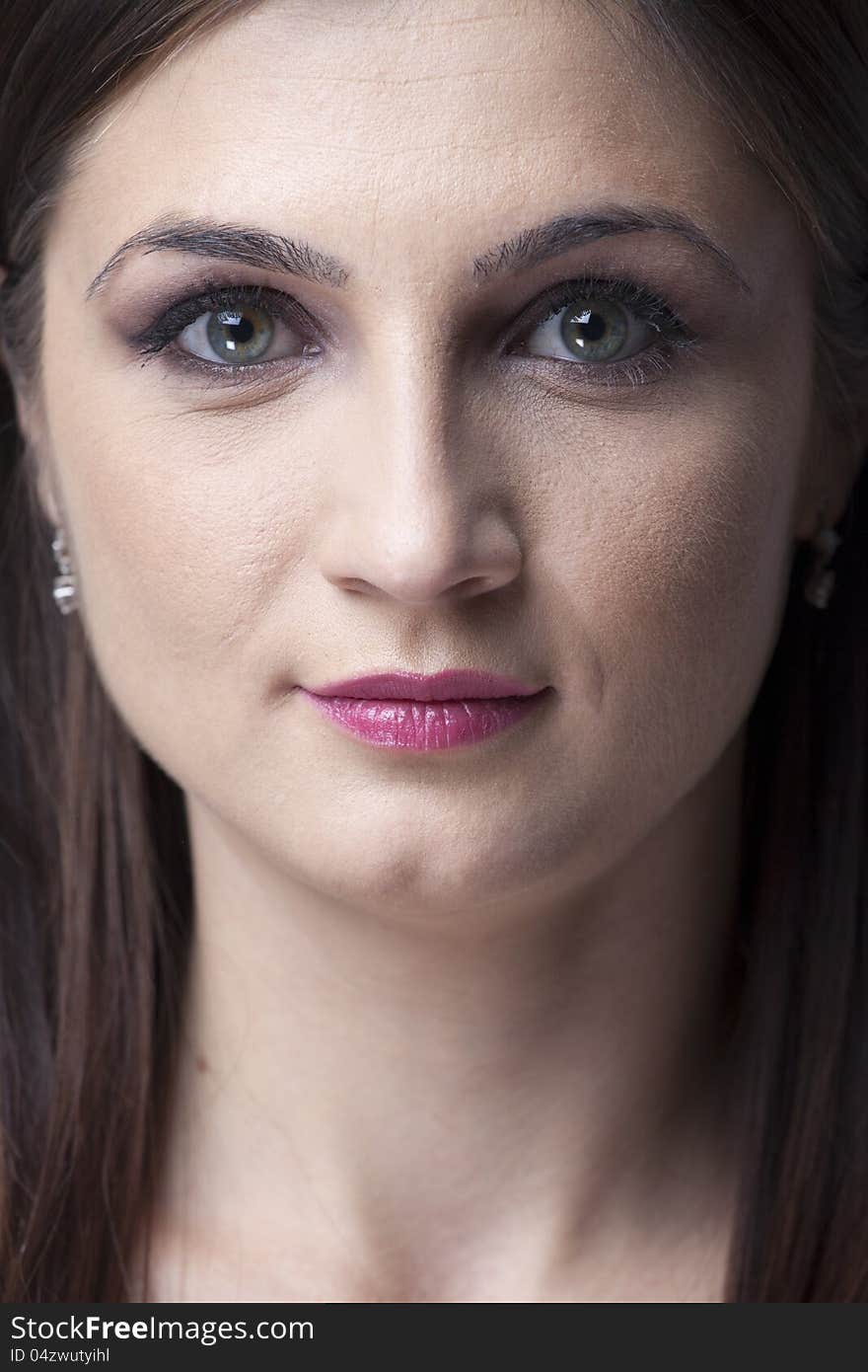 Young business woman posing in studio. Young business woman posing in studio