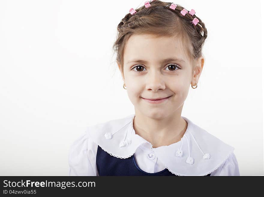 Beautiful school girl posing in studio. Beautiful school girl posing in studio