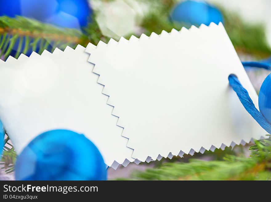 Christmas card with balls spruce twig