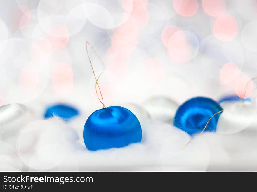 Christmas card with balls and bokeh