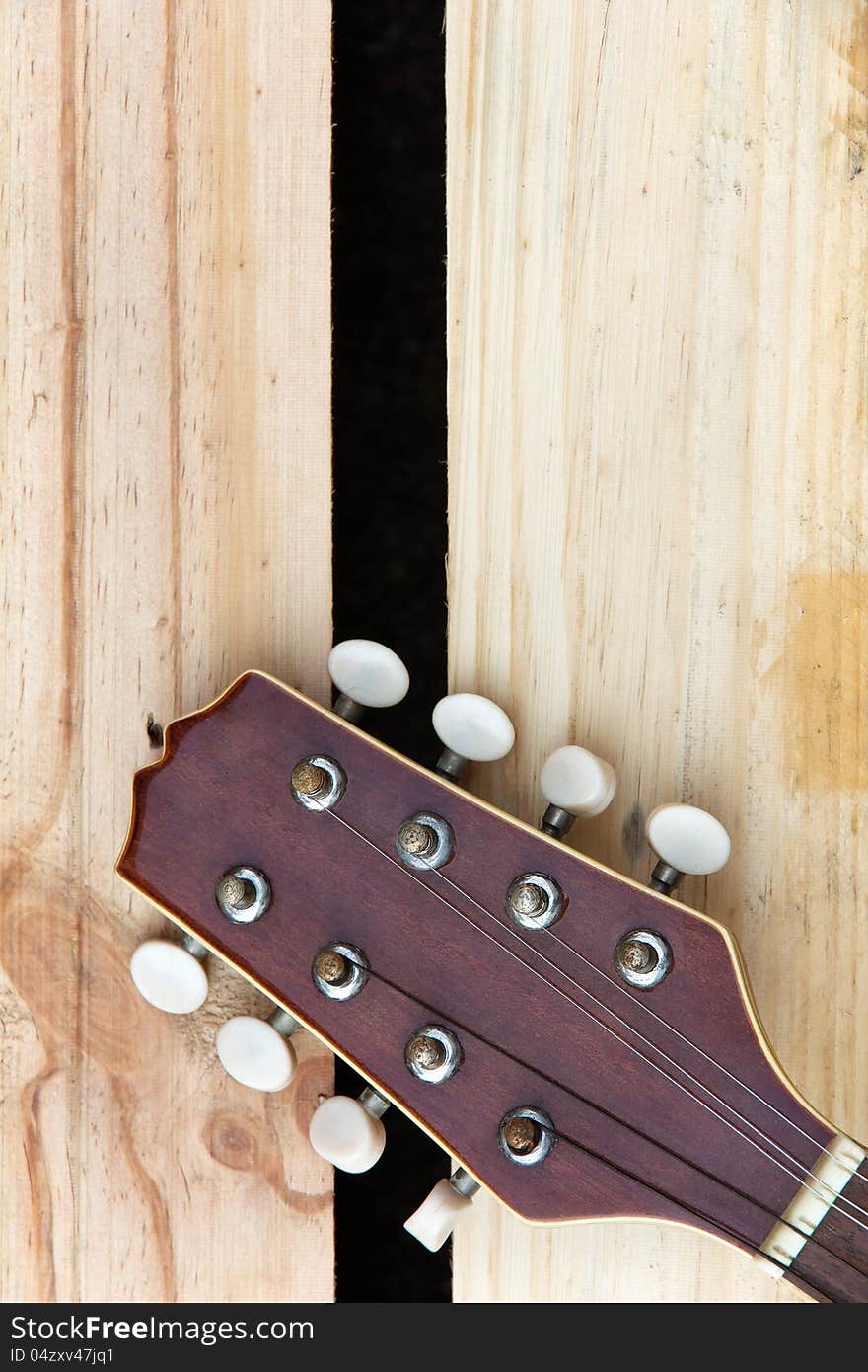 Close up of mandolin headstock background