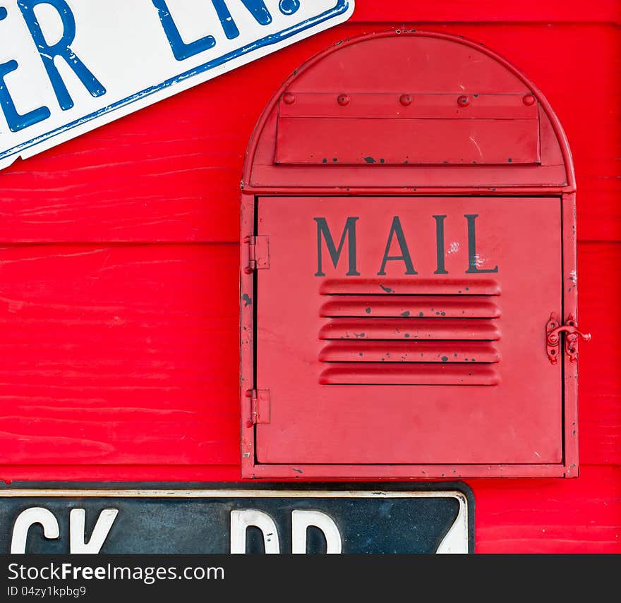 The red mail box hung wall