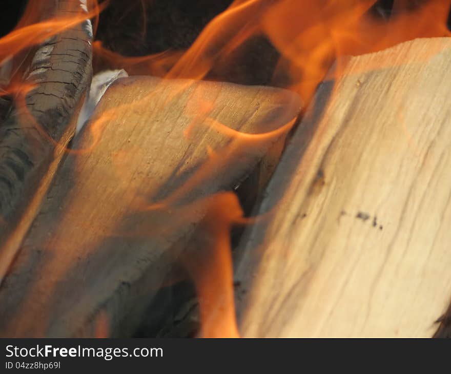 Burning of wood, begins to burn