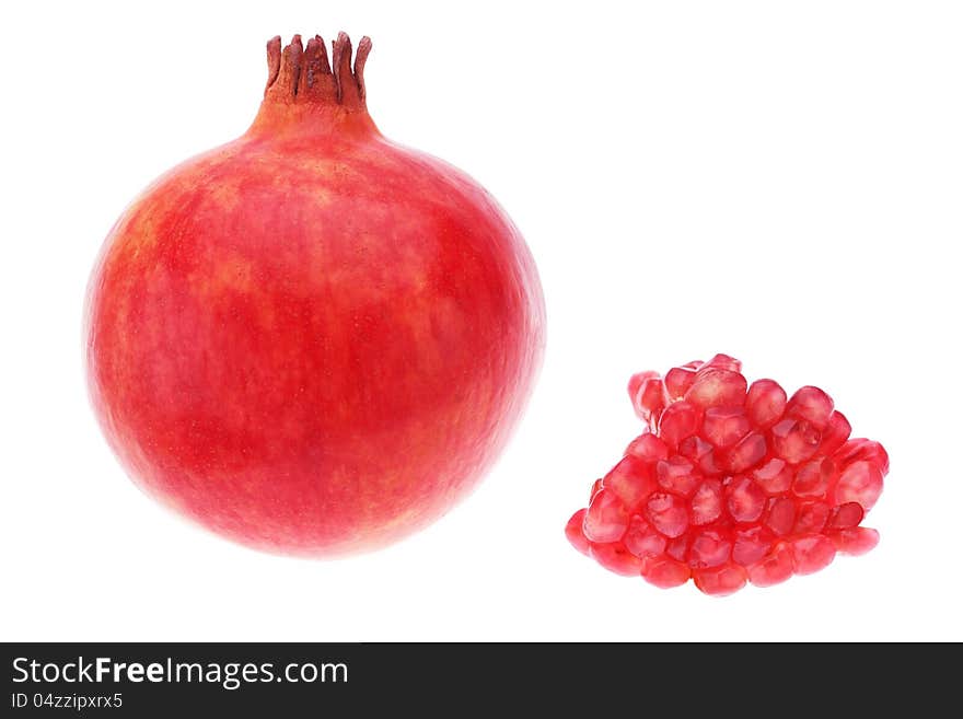 Red pomegranate fruit grains on a white background.