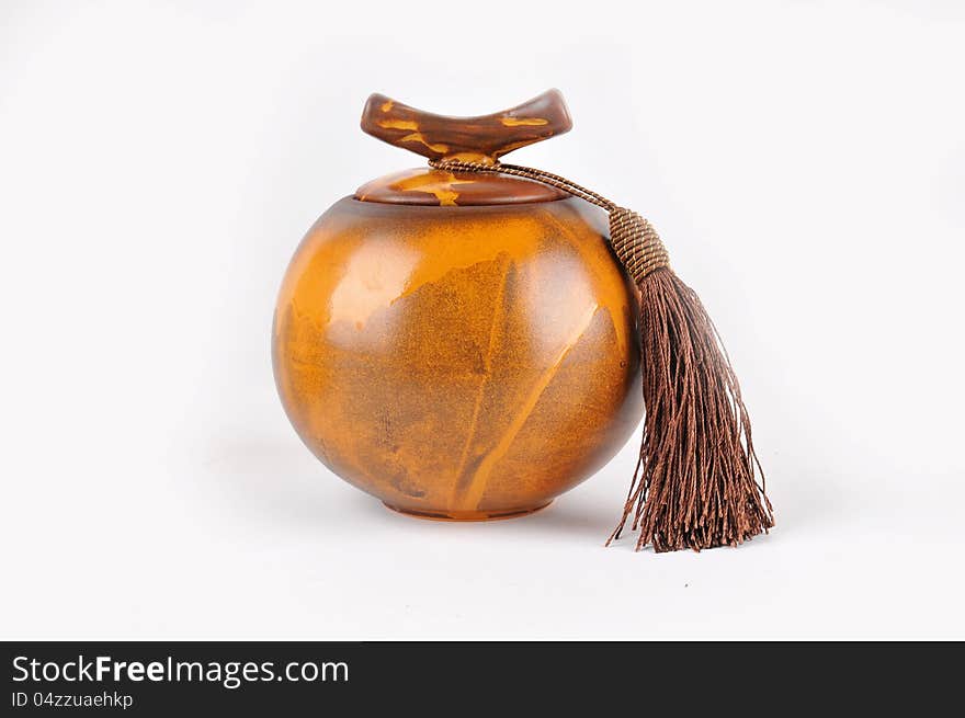 A ceramic jar on a white background