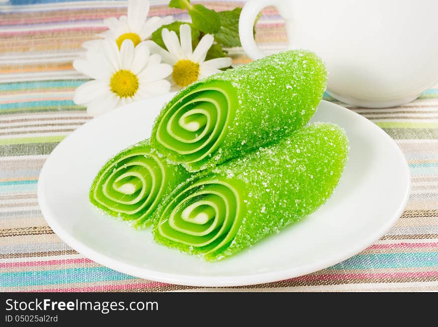 Green Fruit Candy on a plate, closeup