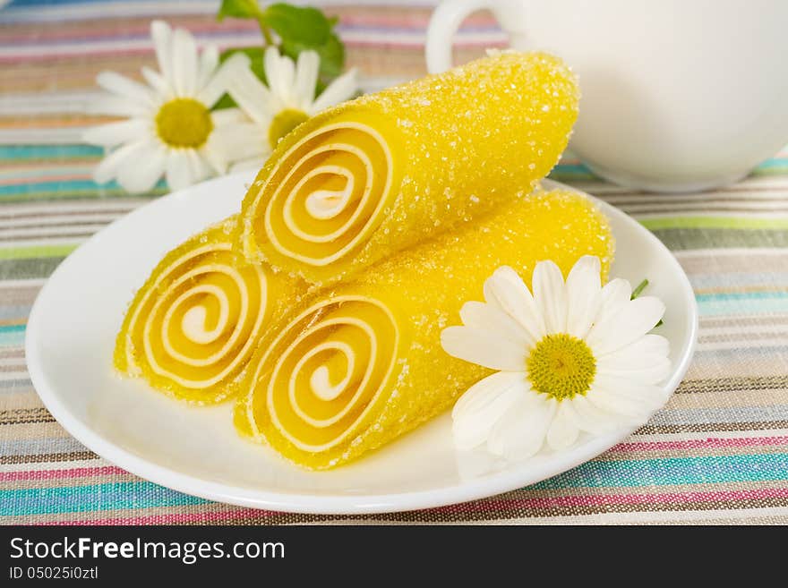 Yellow Candy on a plate, closeup