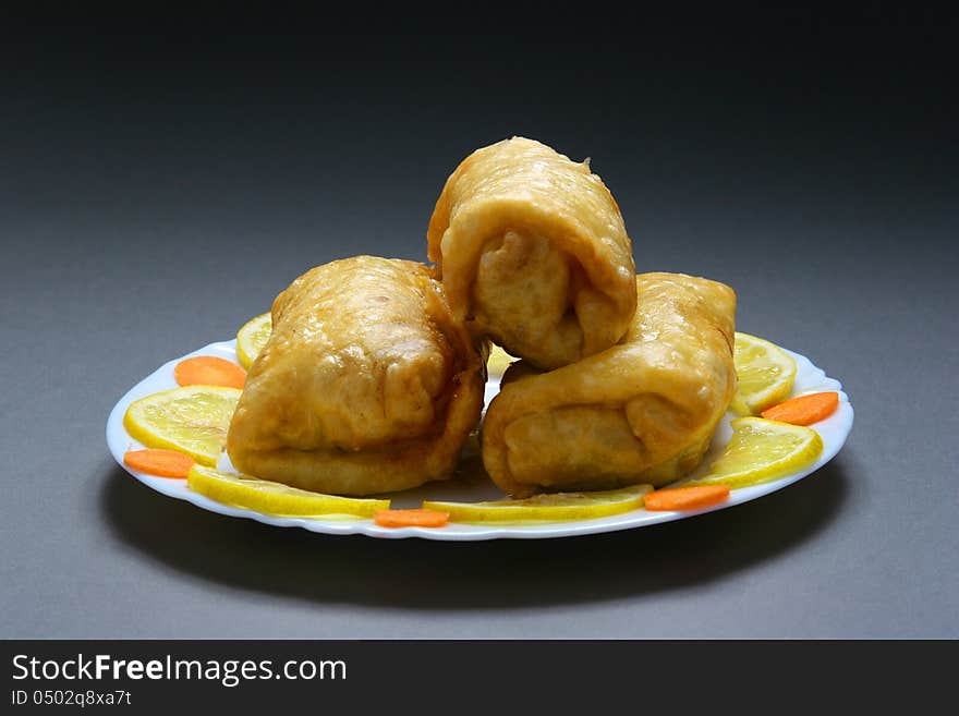 Chinese bread in a plate on a gray background