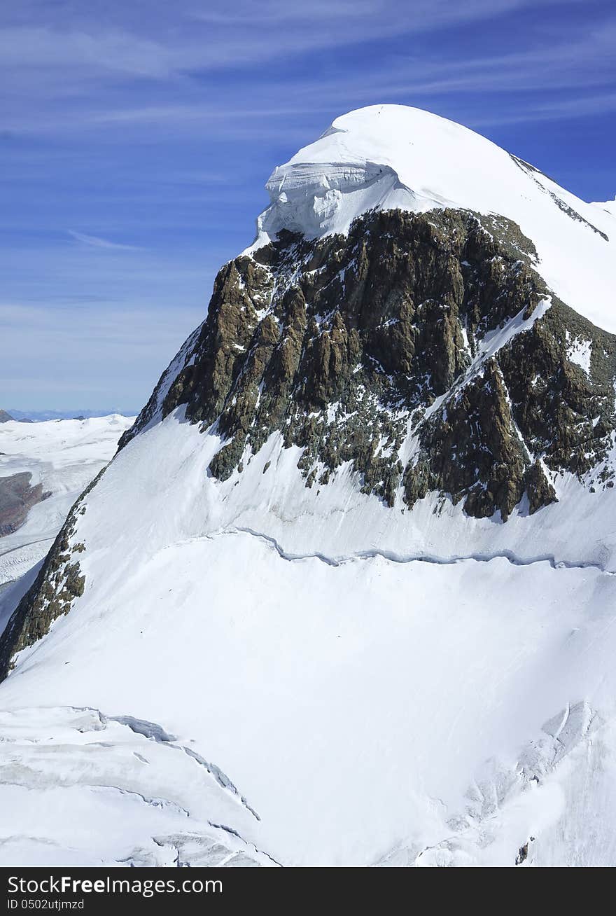 The snow capped summit of Breithorn at 4,159m. The snow capped summit of Breithorn at 4,159m