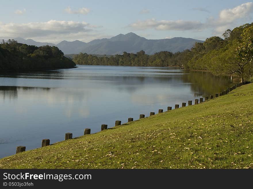 The view west along the Bellinger River at Mylestom provides a spectacular view of the mountains where it begins. The view west along the Bellinger River at Mylestom provides a spectacular view of the mountains where it begins