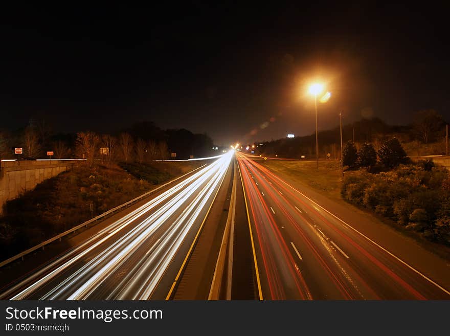 Evening traffic on highway light trails