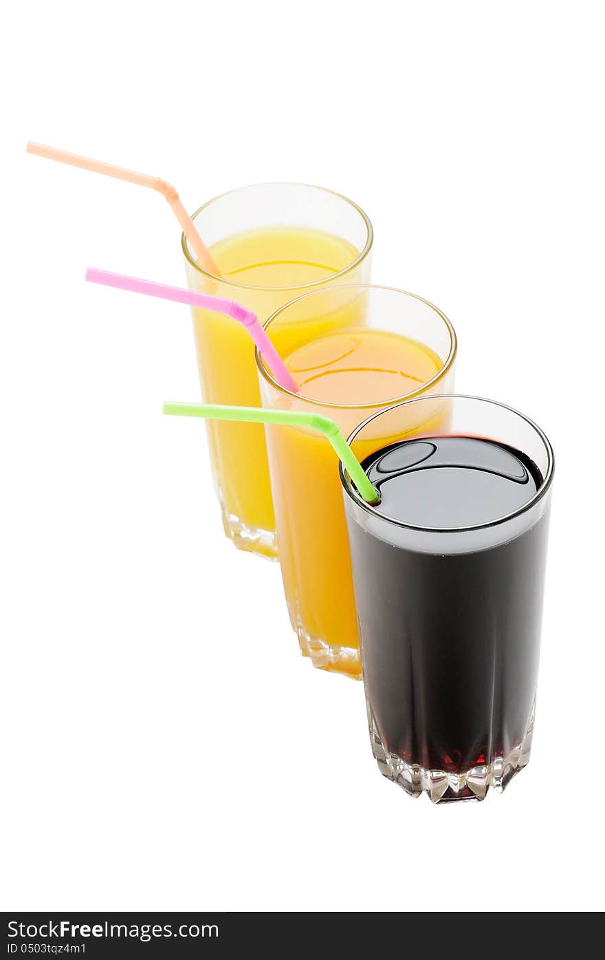 Juice in a glass with straw isolated on white background