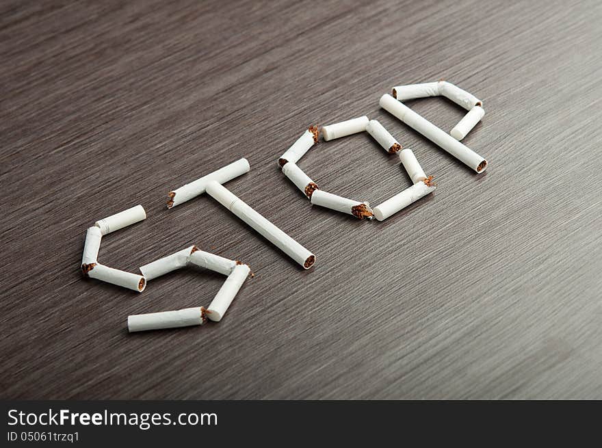 Concept of dangers of smoking. word