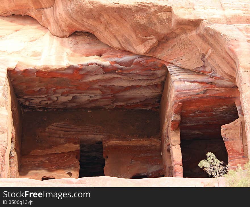 Old nabatean house with whimsical pattern on the ceiling and walls in city Petra, Jordan, november 2012