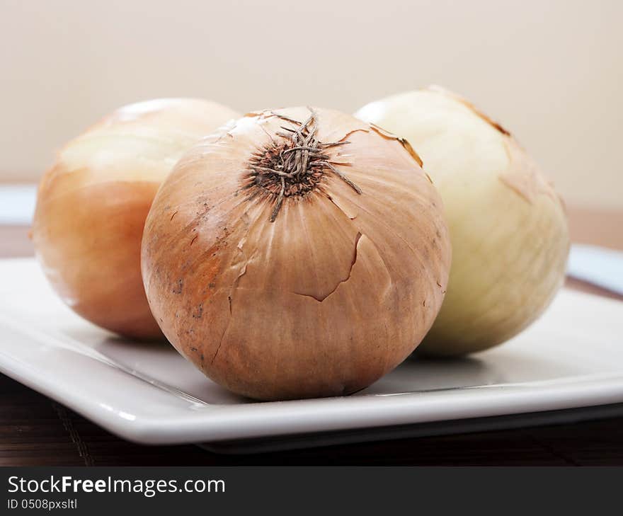 Onion close up on white plate