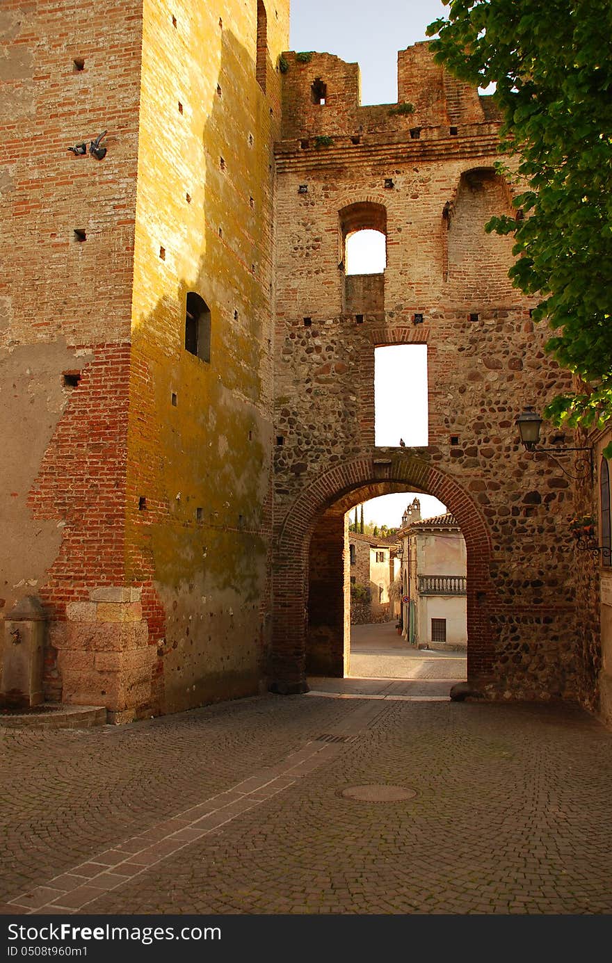 The medieval village of Castellaro Lagusello, Province of Mantova, Italy. The main gate. The medieval village of Castellaro Lagusello, Province of Mantova, Italy. The main gate