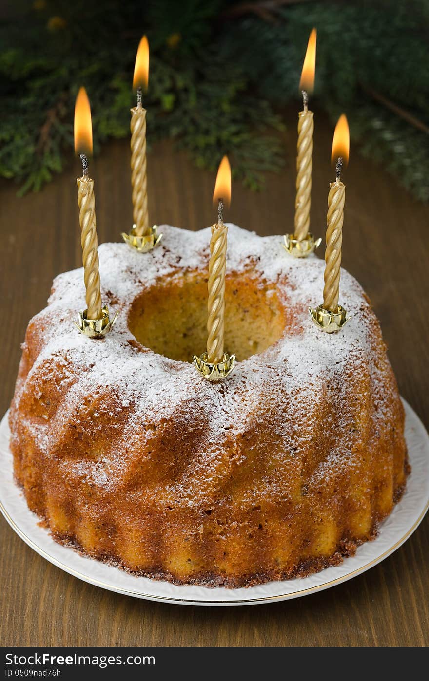 Orange And Walnut Cake With Burning Candles