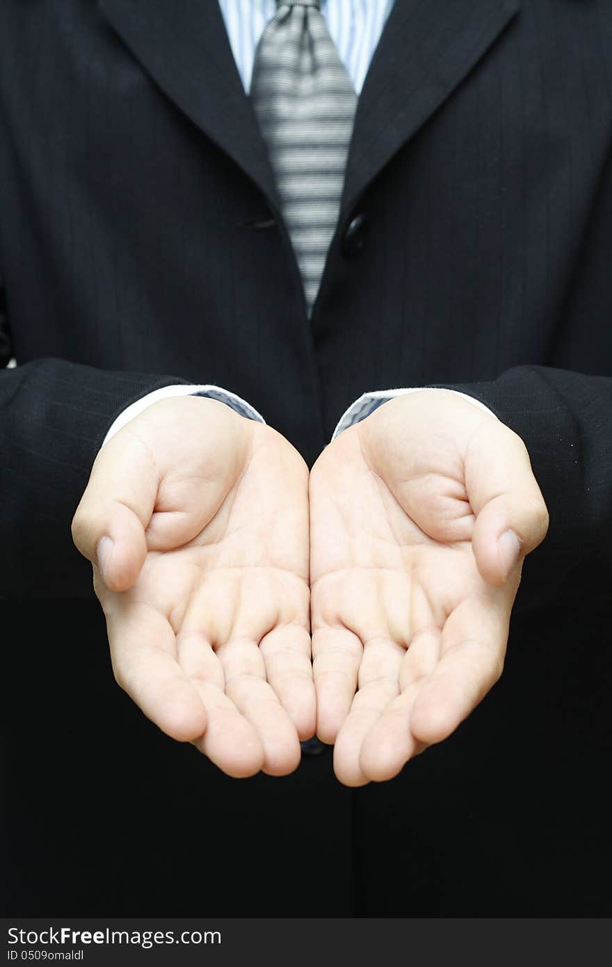 Business man in suit with giving hands. Business man in suit with giving hands.