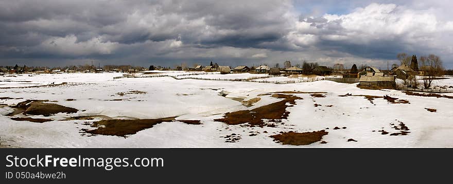 Panoramic view of the old Russian village in the forest. Panoramic view of the old Russian village in the forest.