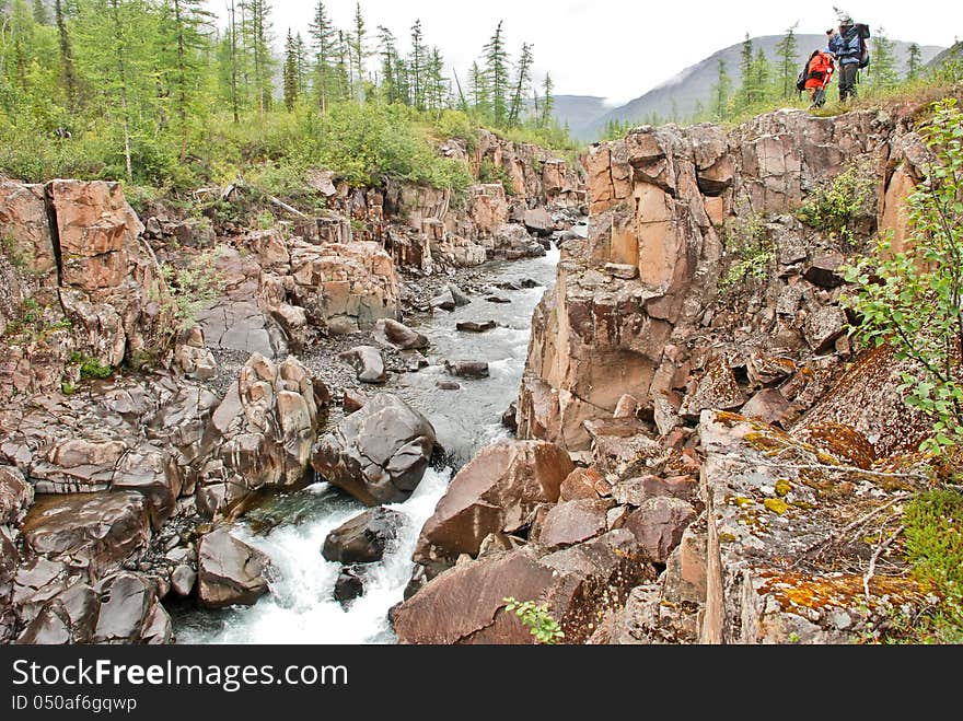 Roaring waterfalls on the river dug canyon