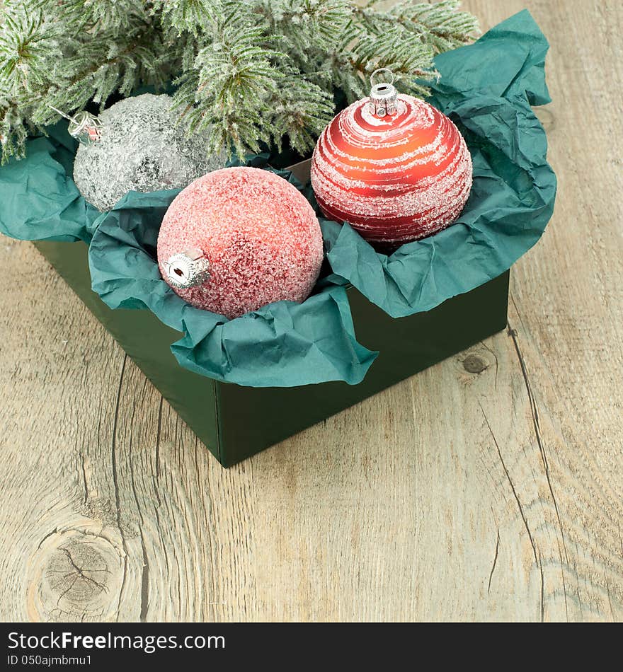 Christmas ball.
Christmas decoration over wooden background.