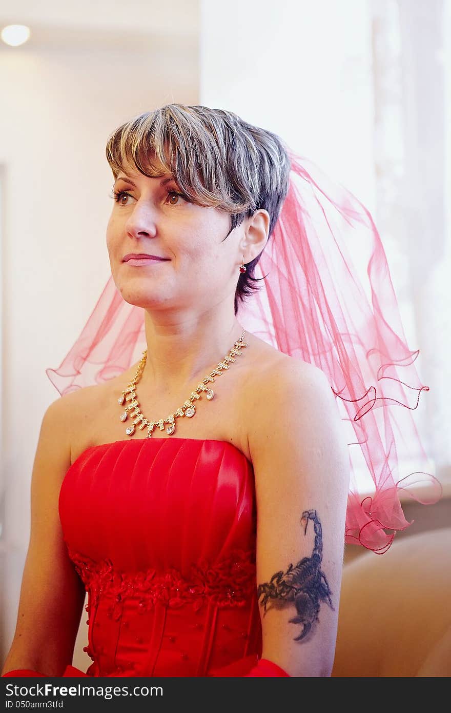 Portrait Of The Beautiful Bride In A Red Dress