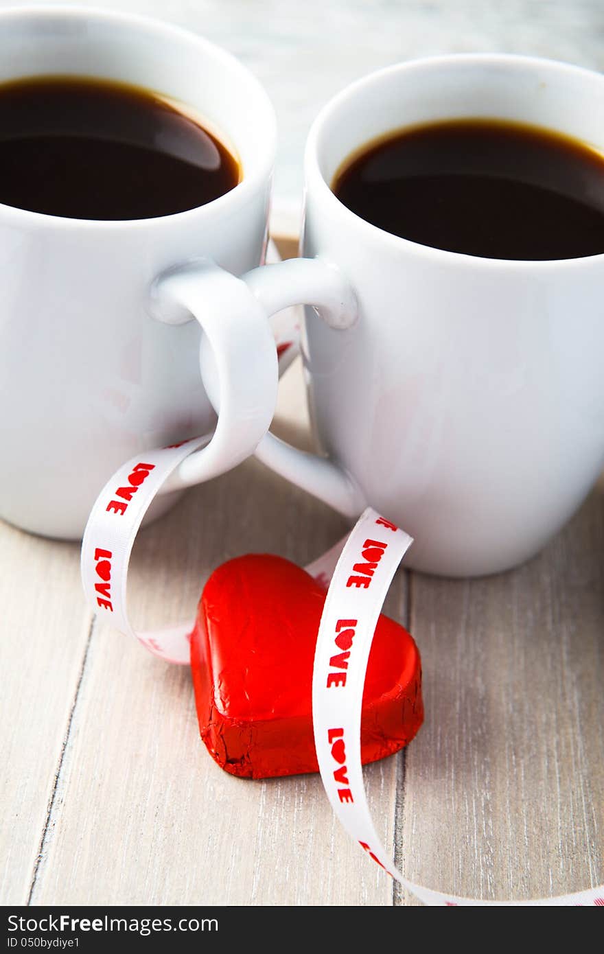 Morning Valentine coffee with sweet marzipan heart. Morning Valentine coffee with sweet marzipan heart