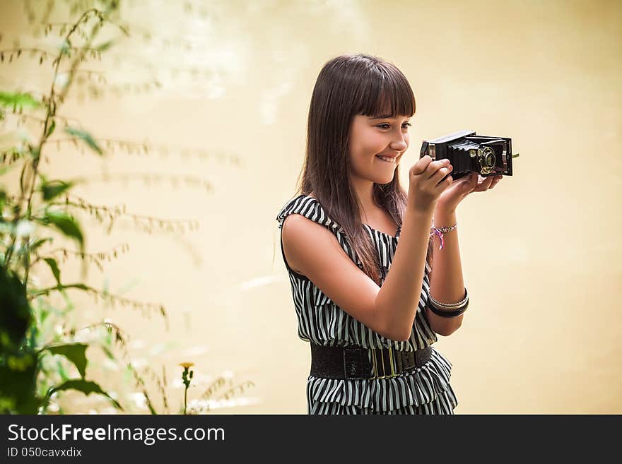 Girl With Antique Camera