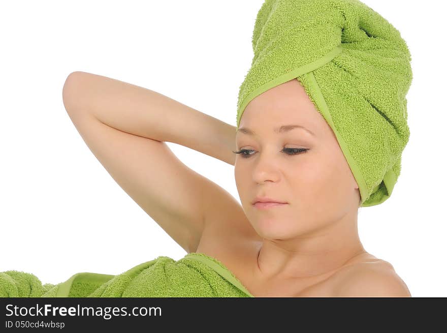 Spa Girl. Beautiful Young Woman After Bath with green towel. isolated on white