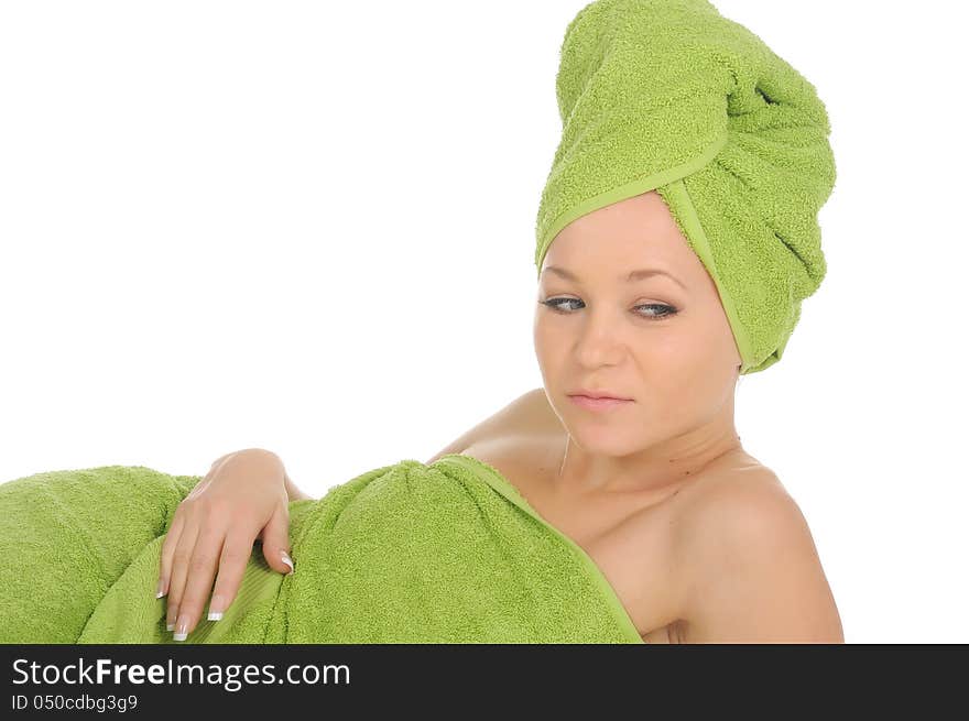 Spa Girl. Beautiful Young Woman After Bath with green towel. isolated on white