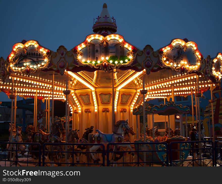 Night view of a carousel in Bucharest.