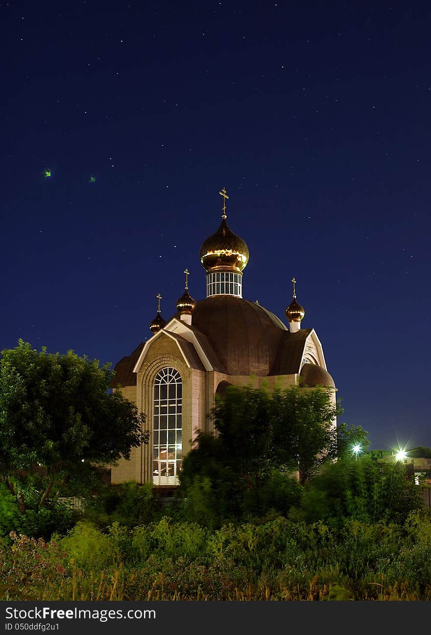 Beautiful and mysterious church on the starry sky