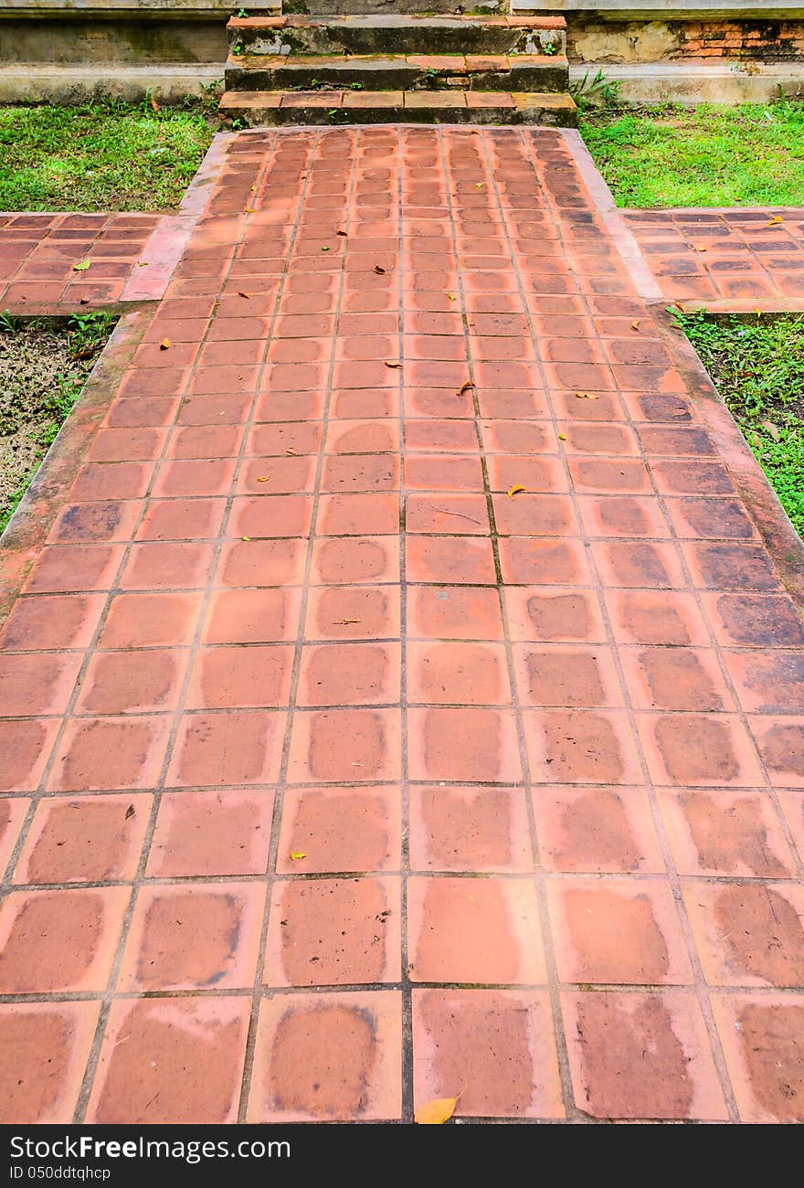 The ancient walk way is leading to the pavilion