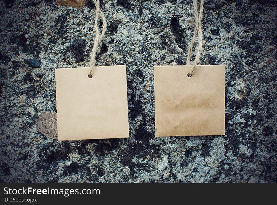 Blank Paper Tags on grungy wall backround. Blank Paper Tags on grungy wall backround