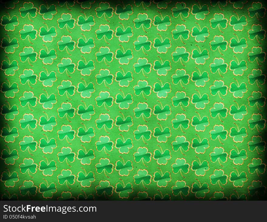 Illustration of grunge green background with shamrock or clover. Illustration of grunge green background with shamrock or clover.