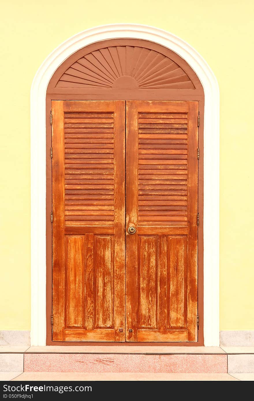 Thai art with wooden door.