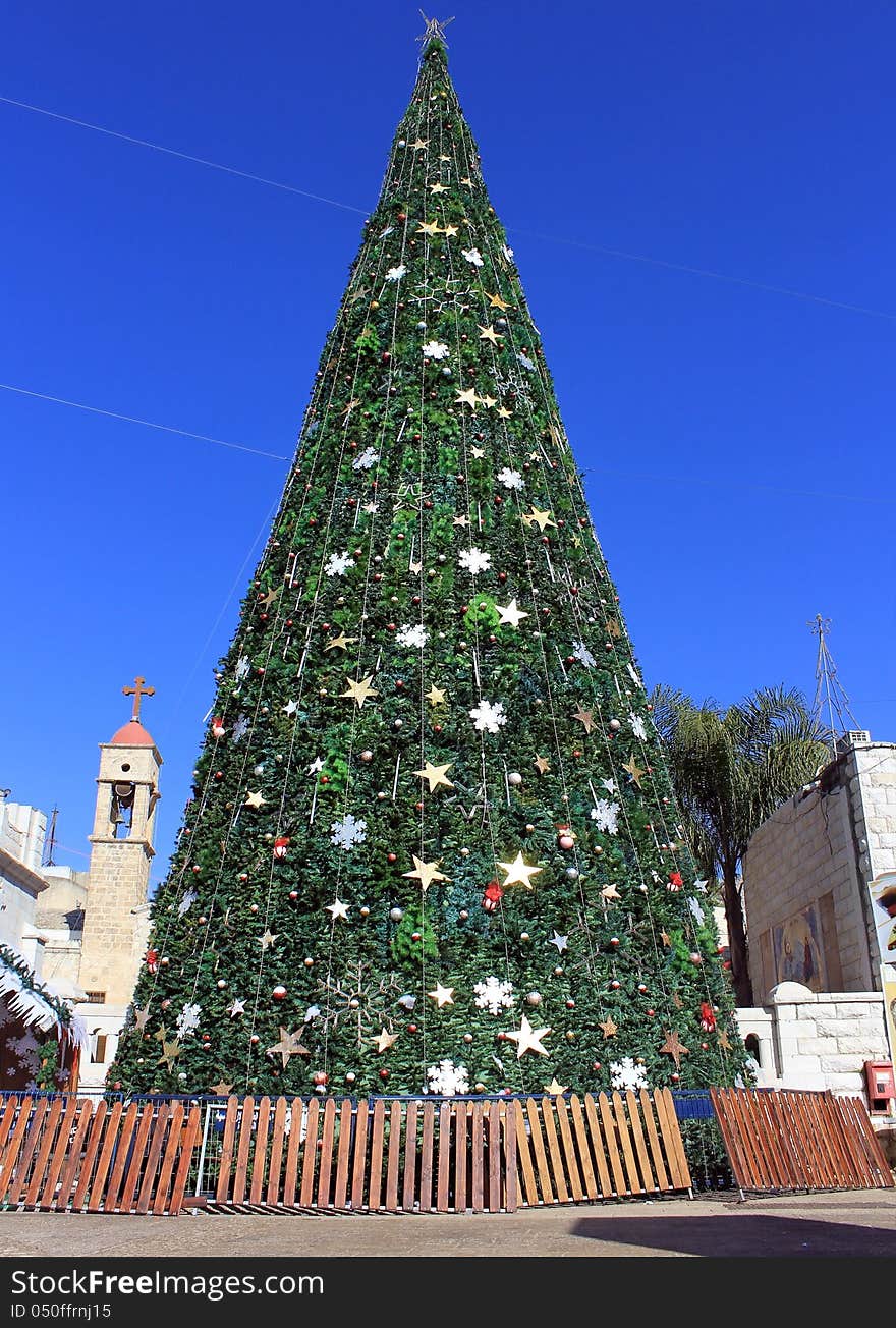 Christmas tree in the square in front of the Greek Orthodox Church of the Annunciation in Nazareth, Israel. Christmas tree in the square in front of the Greek Orthodox Church of the Annunciation in Nazareth, Israel