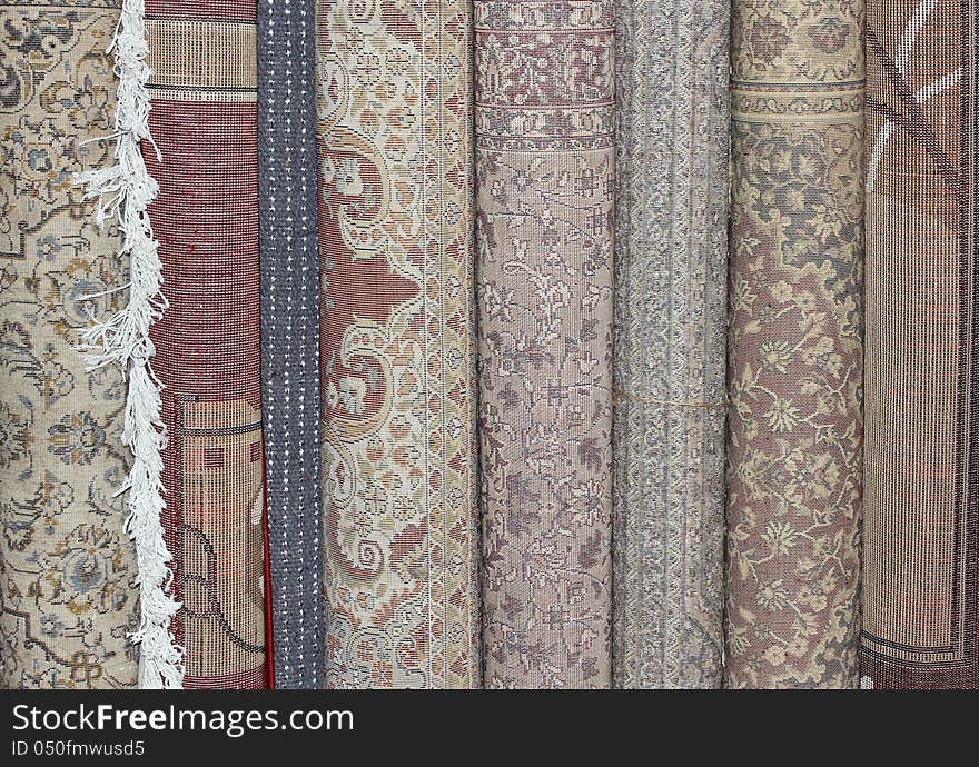 Folded carpets at the market in india. Folded carpets at the market in india