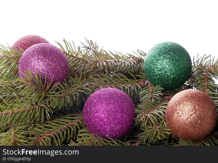 Colored balls are on the fir trees