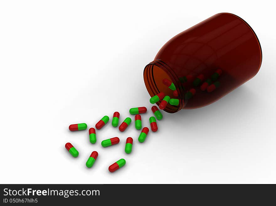 Red green capsules spilled from a bottle