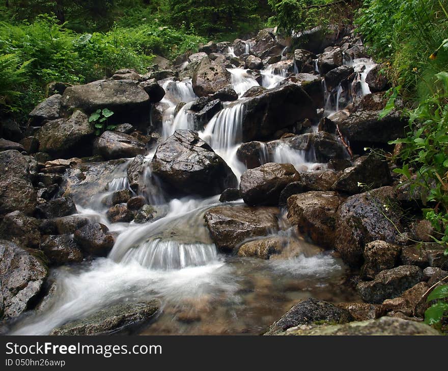 Long shutter time picture of a mountain stream