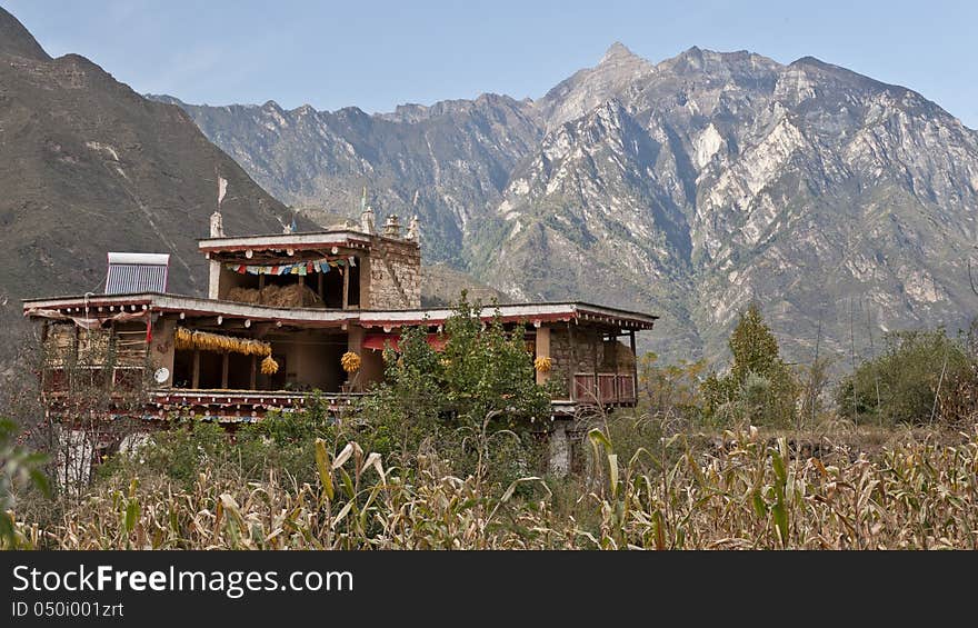 A Tibetan folk house at the foot of mountain