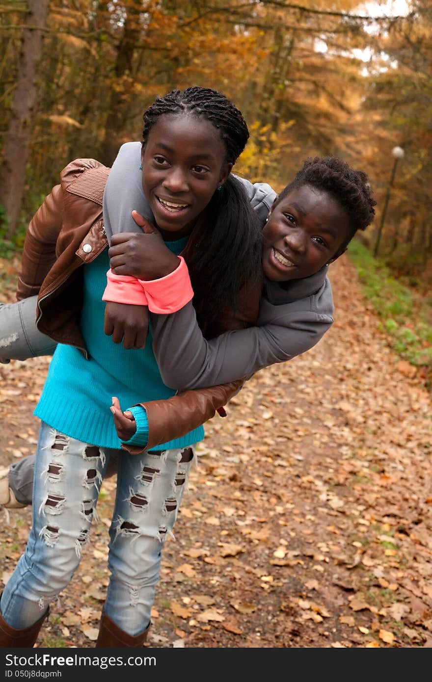 Happy foster children in the forest are having fun. Happy foster children in the forest are having fun