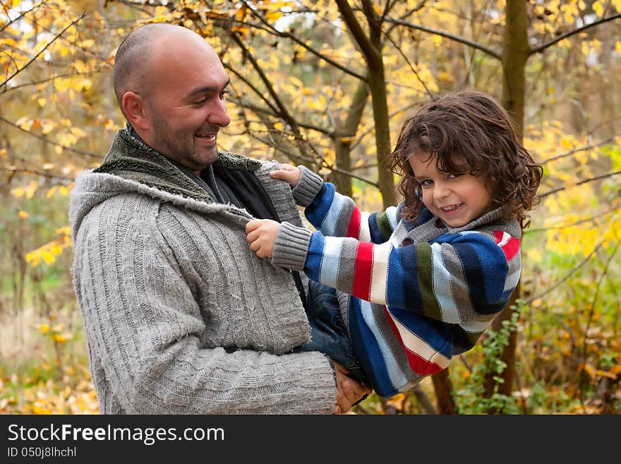 Happy foster children in the forest are having fun. Happy foster children in the forest are having fun