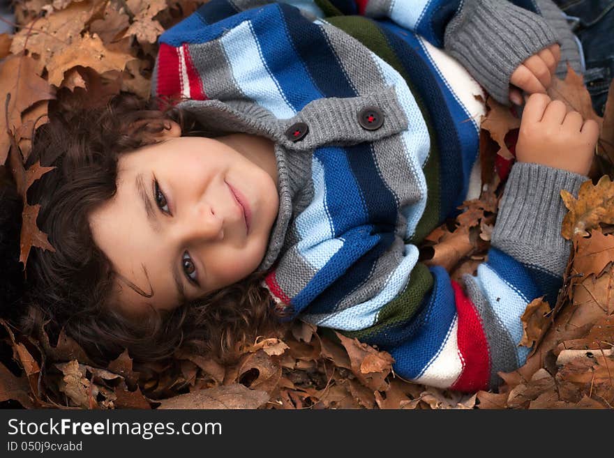 Happy Todler With Leafs