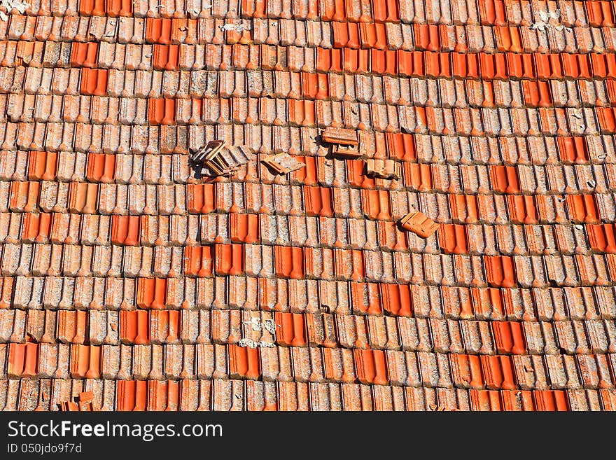 Old red tile on a roof