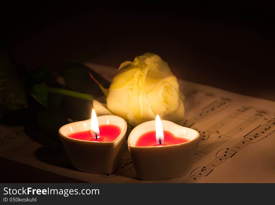 Valentine Concept. Rose And Two Heart  Candles