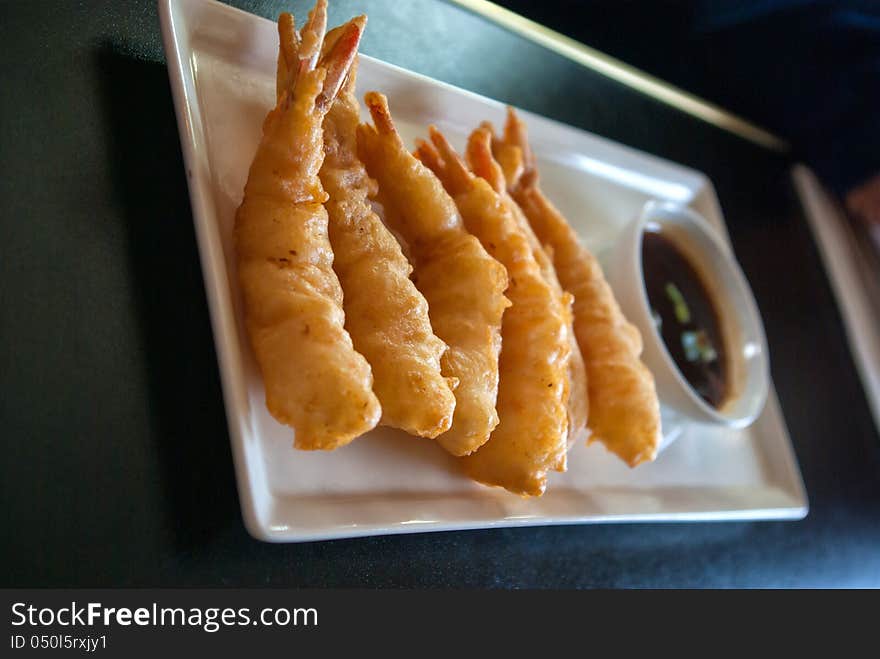 Deep fried popcorn shrimp platter in a taditional Chinese restaurant