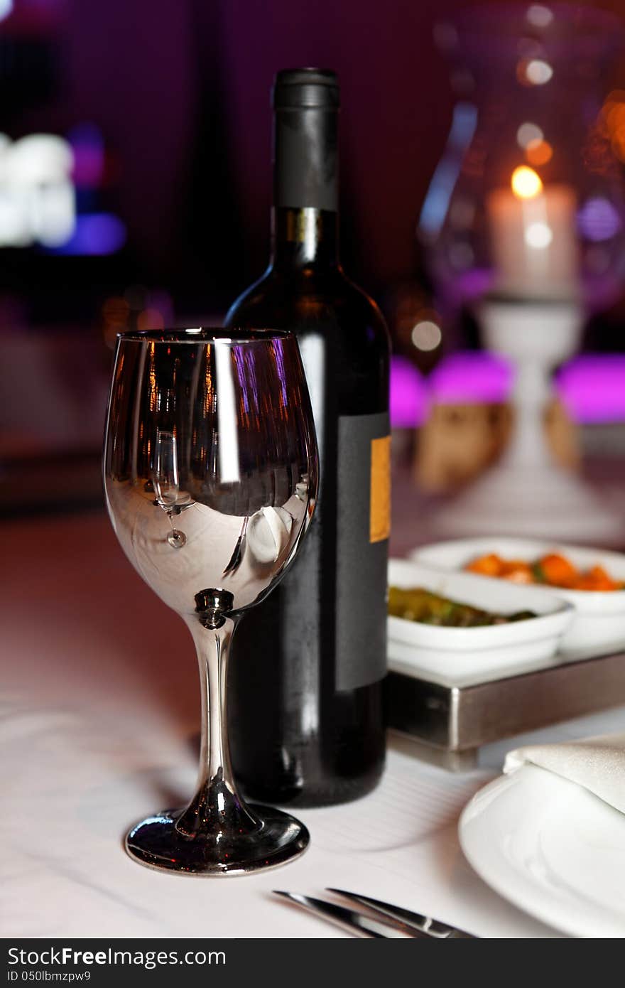 Glass and wine on festive table