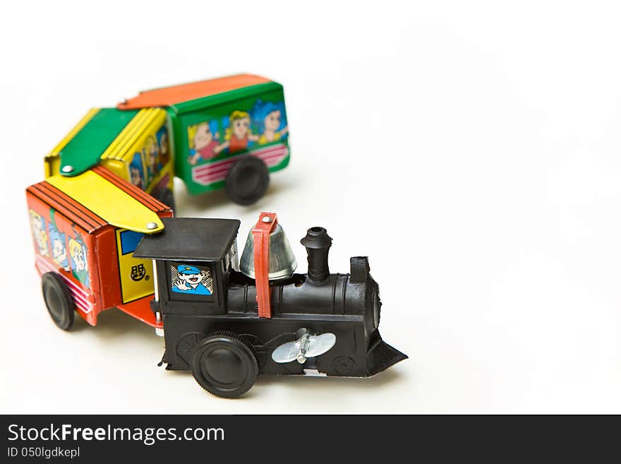 TOY TRAIN ON WHITE BACKGROUND